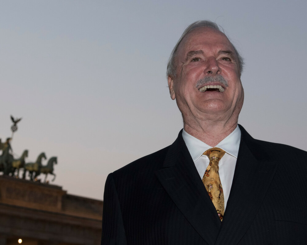 John Cleese laughing in photo