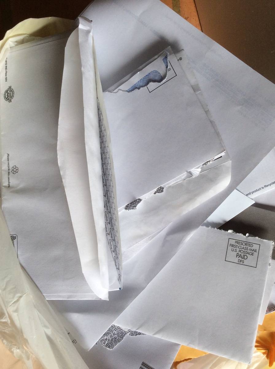 Junk mail letters scattered on table