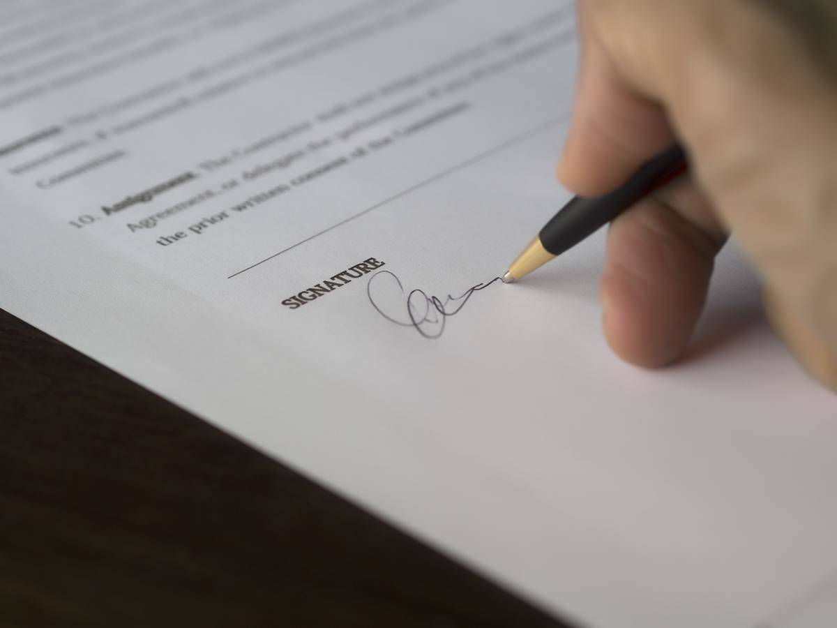 Person signing letter