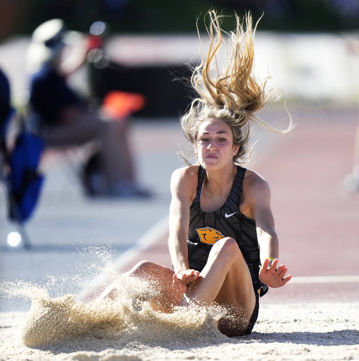 Sydnie Vanek of Clovis leaps in the girls long jump during the 102nd CIF State Track and Field Championships 