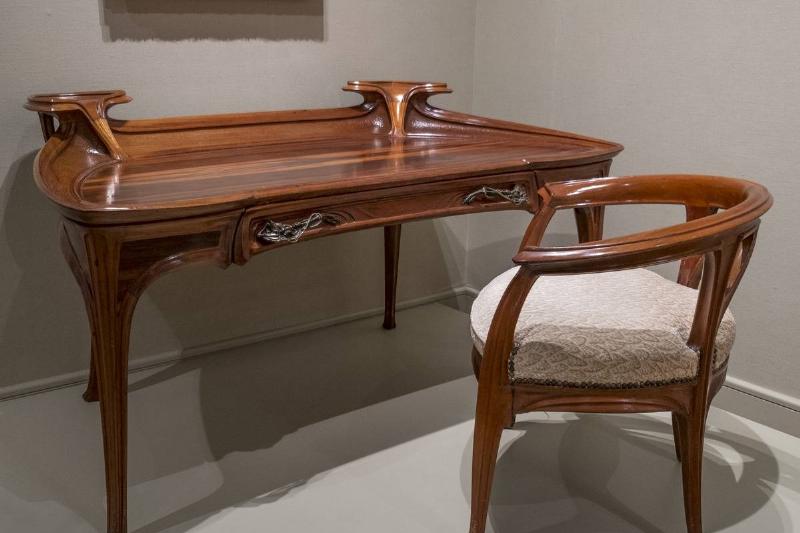 Desk and Chair, circa 1900. Jacques Gruber, French, 1870-1936, Mahogany with Bronze and upholstery