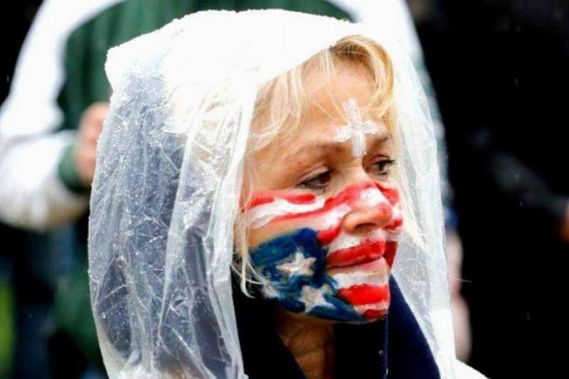 woman with american flag on her face