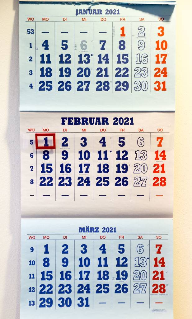 Vintage looking calendar blue and red writing 