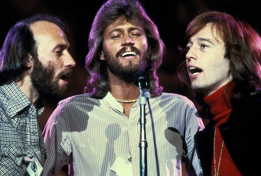 bee gees singing on stage