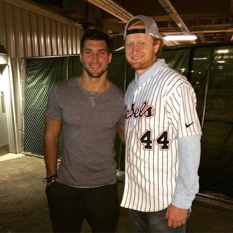 brady in a baseball shirt posing