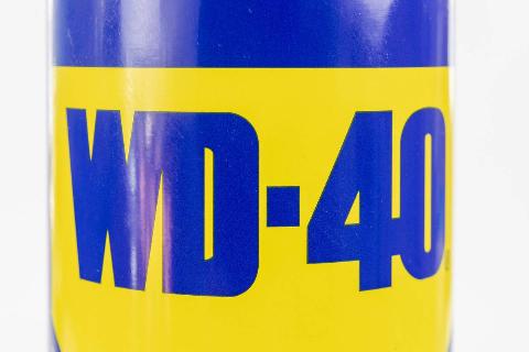 In this photo illustration, the branding of a WD-40...