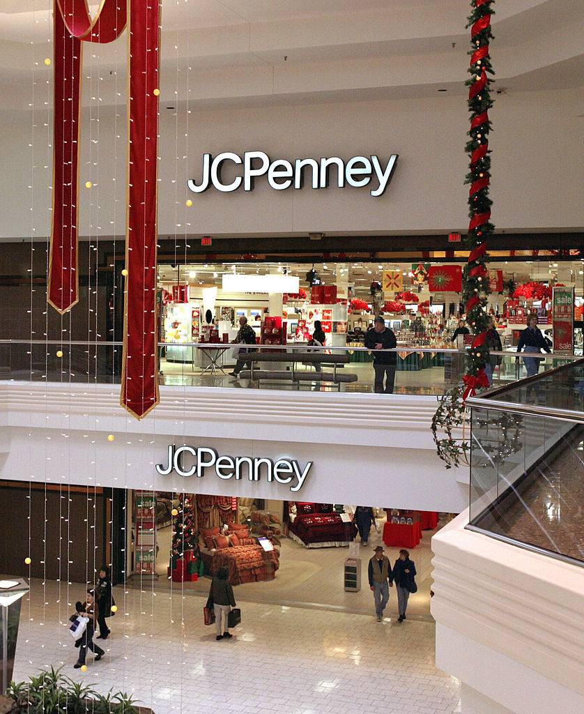 Holiday decorations hang near an entrance to the JC Penney store