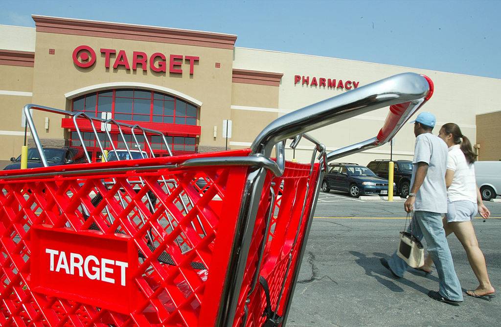 Customers walk outside a Target store