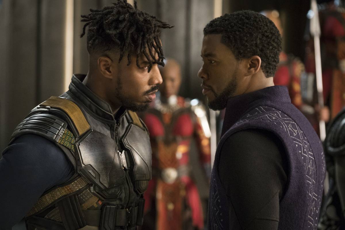 Chadwick Boseman and Michael B. Jordan stare each other down as King T'Challa and Erik Killmonger in Black Panther