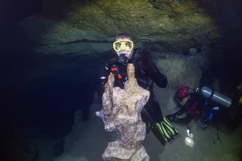 A diver is seen with stalagmite in Big Cave, Hatay, Turkiye on October 27, 2022.