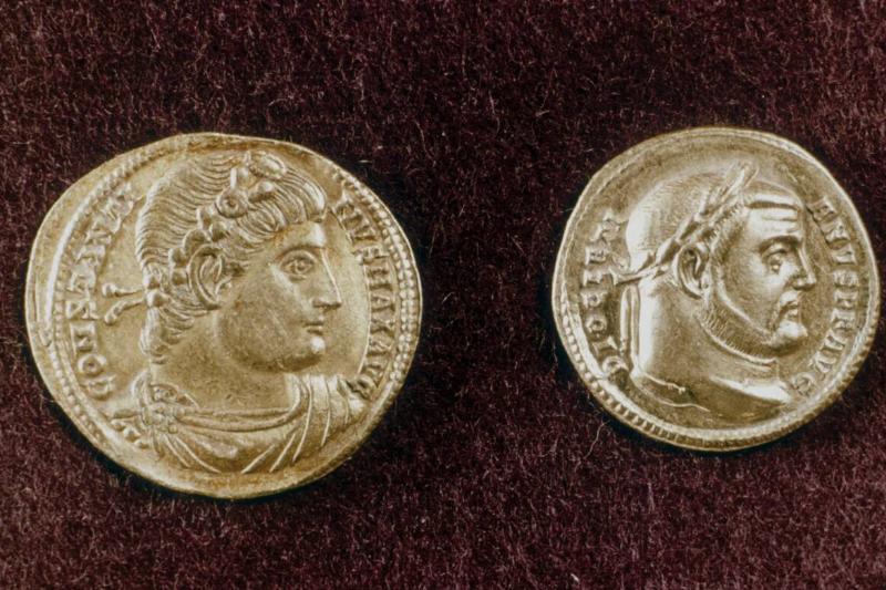 Gold coins showing heads of Roman Emperors Constantine the Great and Diocletian, 4th century.