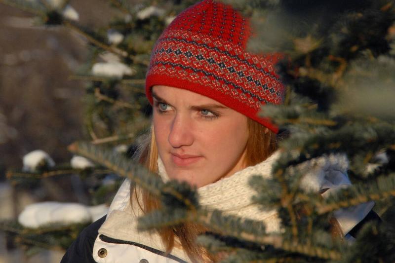 Lake Elmo/December 7,2010/ 4 PM IN THIS PHOTO:] (Left to right) Sixteen-year-old Ellie Krienke of Shoreview looked for the perfect Christmas tree to cut at Krueger's Christmas Tree Farm.