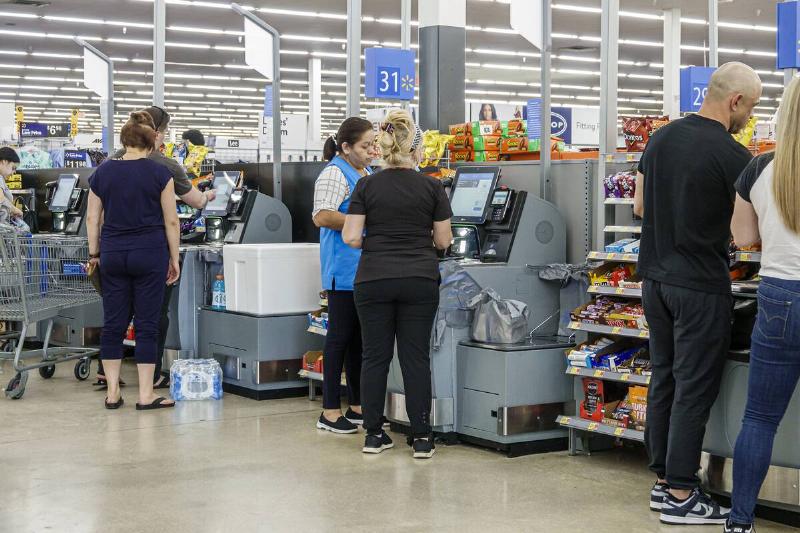 Miami, Florida, Doral, Walmart store, self service checkout, associate helping