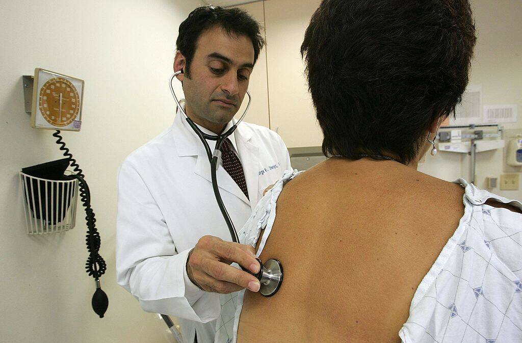 doctor examining a patient