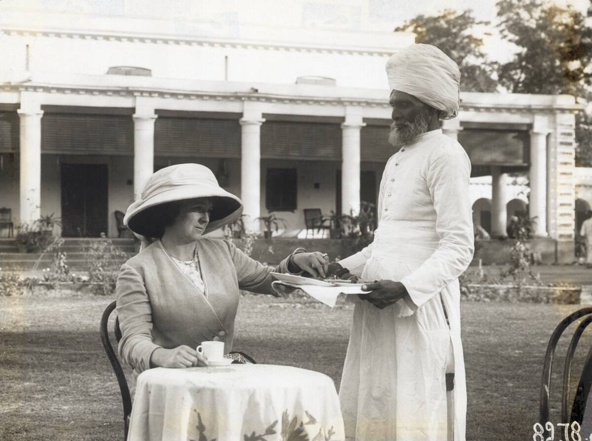 Hindu Serving Tea to Colonial Woman