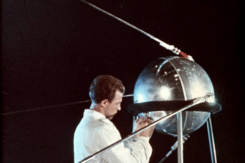 Soviet technician working on sputnik 1, 1957.