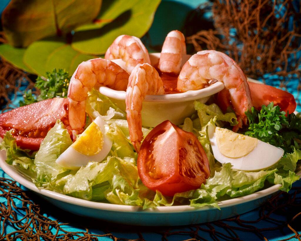 shrimp cocktail with tomatoes and hard boiled eggs