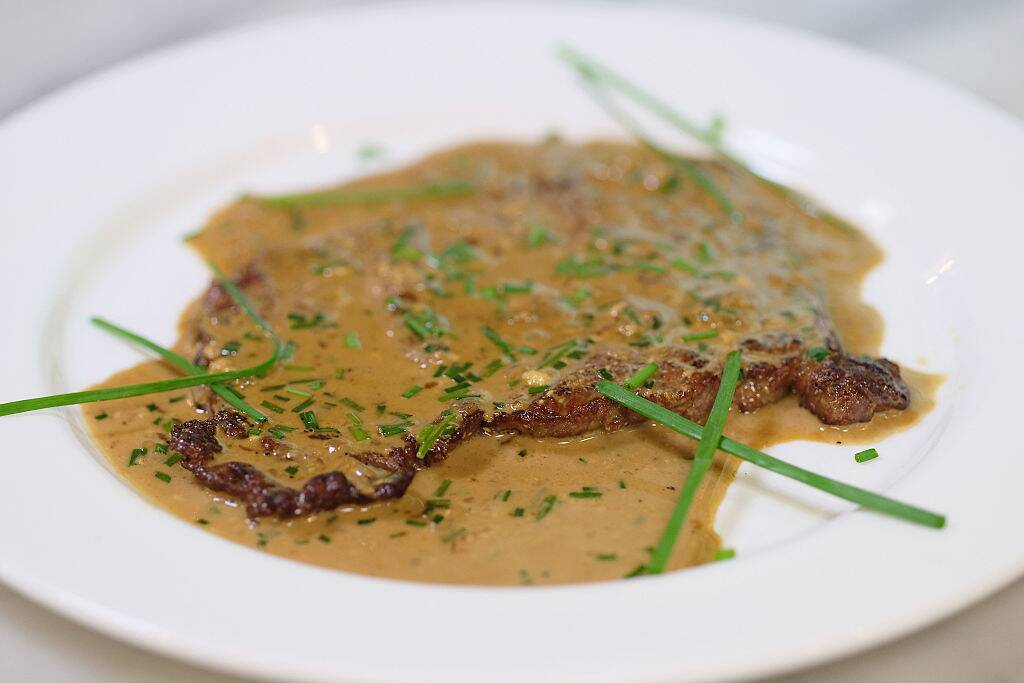 steak diane with a brown sauce