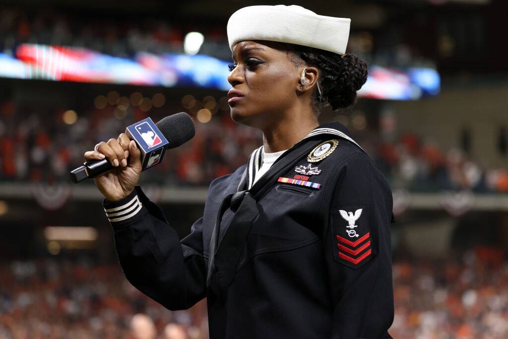 Soldier singing anthem