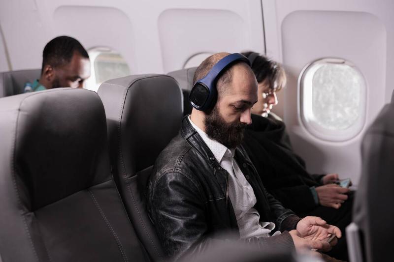 diverse-group-passengers-travelling-by-airplane-commercial-flight-flying-with-international-airline-go-holiday-trip-travellers-sitting-plane-seats-aerial-transportation