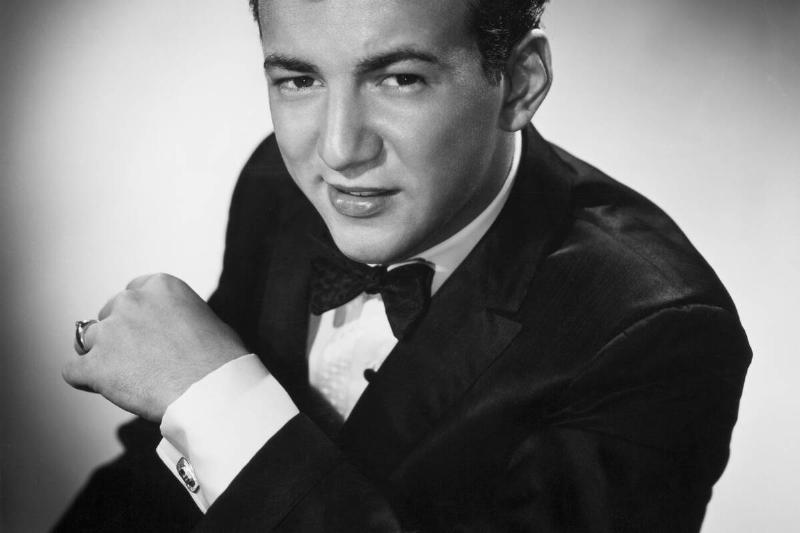 Singer [redacted] Wearing Tuxedo