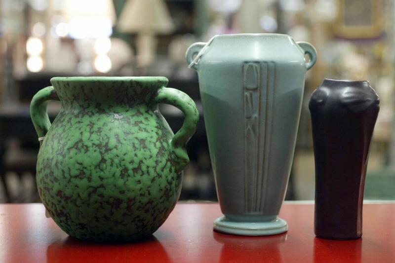 (5/13/04 waltham)Judith Miller at Massachusetts Antiques Cooperative. Roseville art pottery (Staff Photo Michael fein) Saved in AdvNews