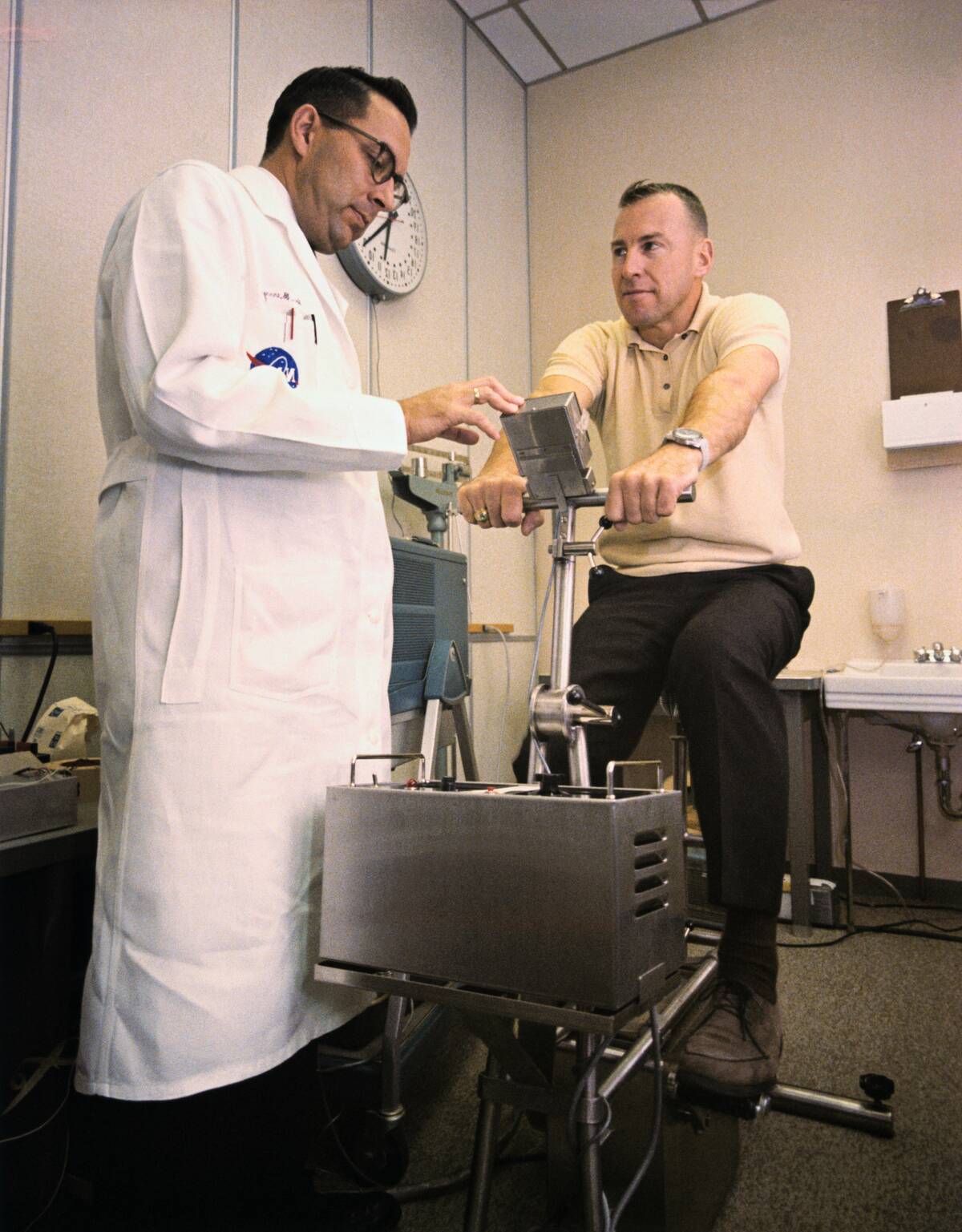 Doctor Examines James Lovell