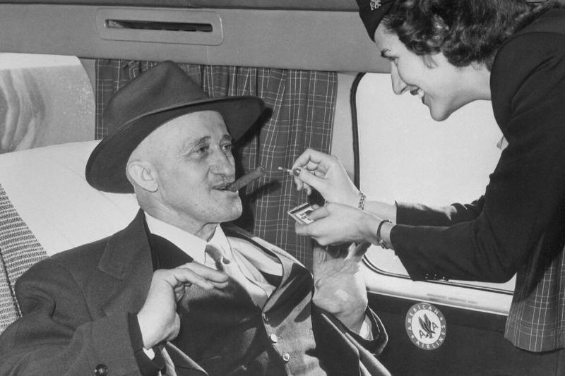 Flight Attendant Lighting Cigar for Passenger