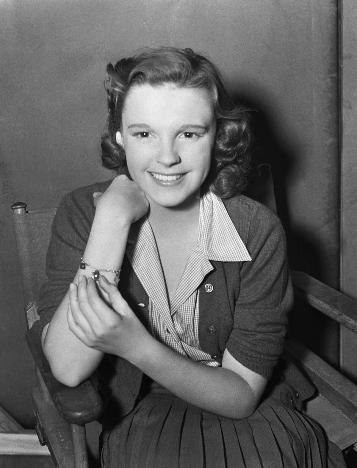 Judy Garland Posing While Sitting