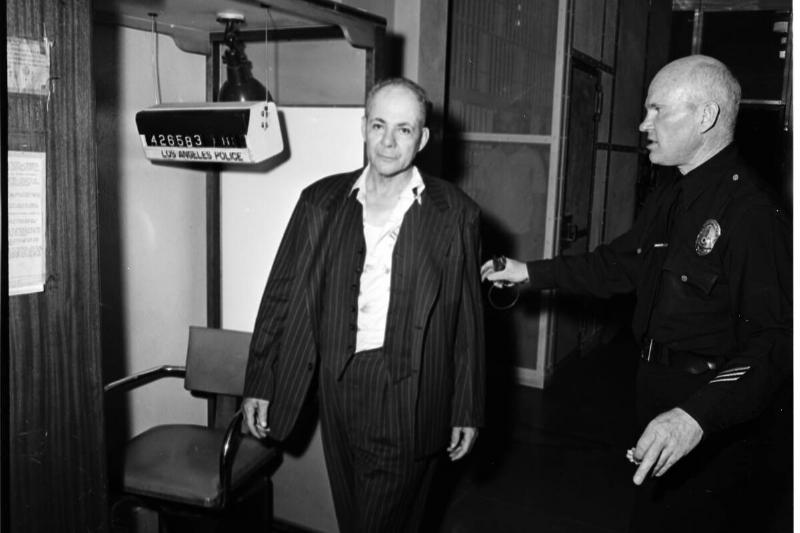 Man drunk -- went berserk on Los Angeles bound jet airliner (United DC-8), 1961