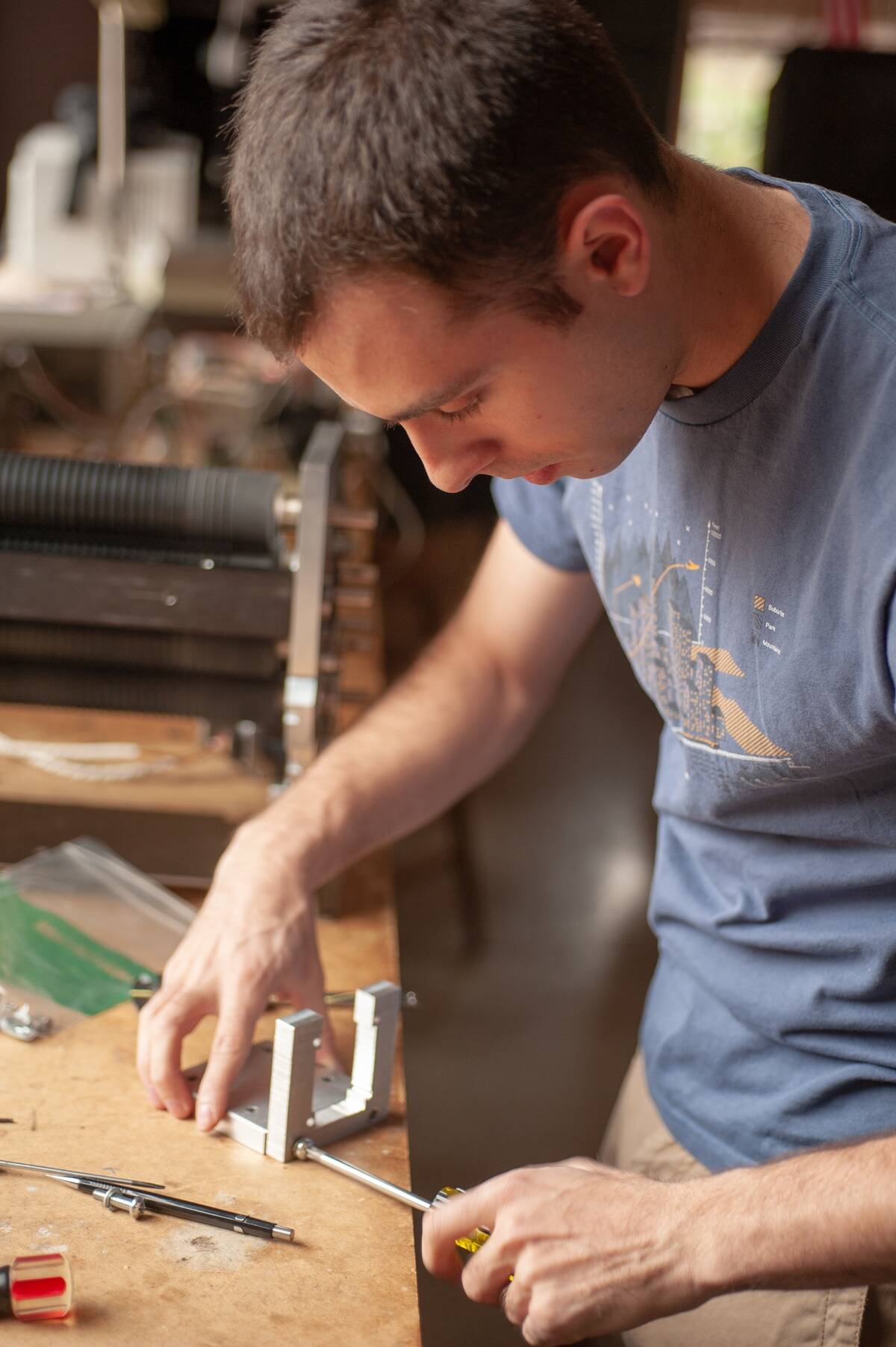 Person Using Screwdriver