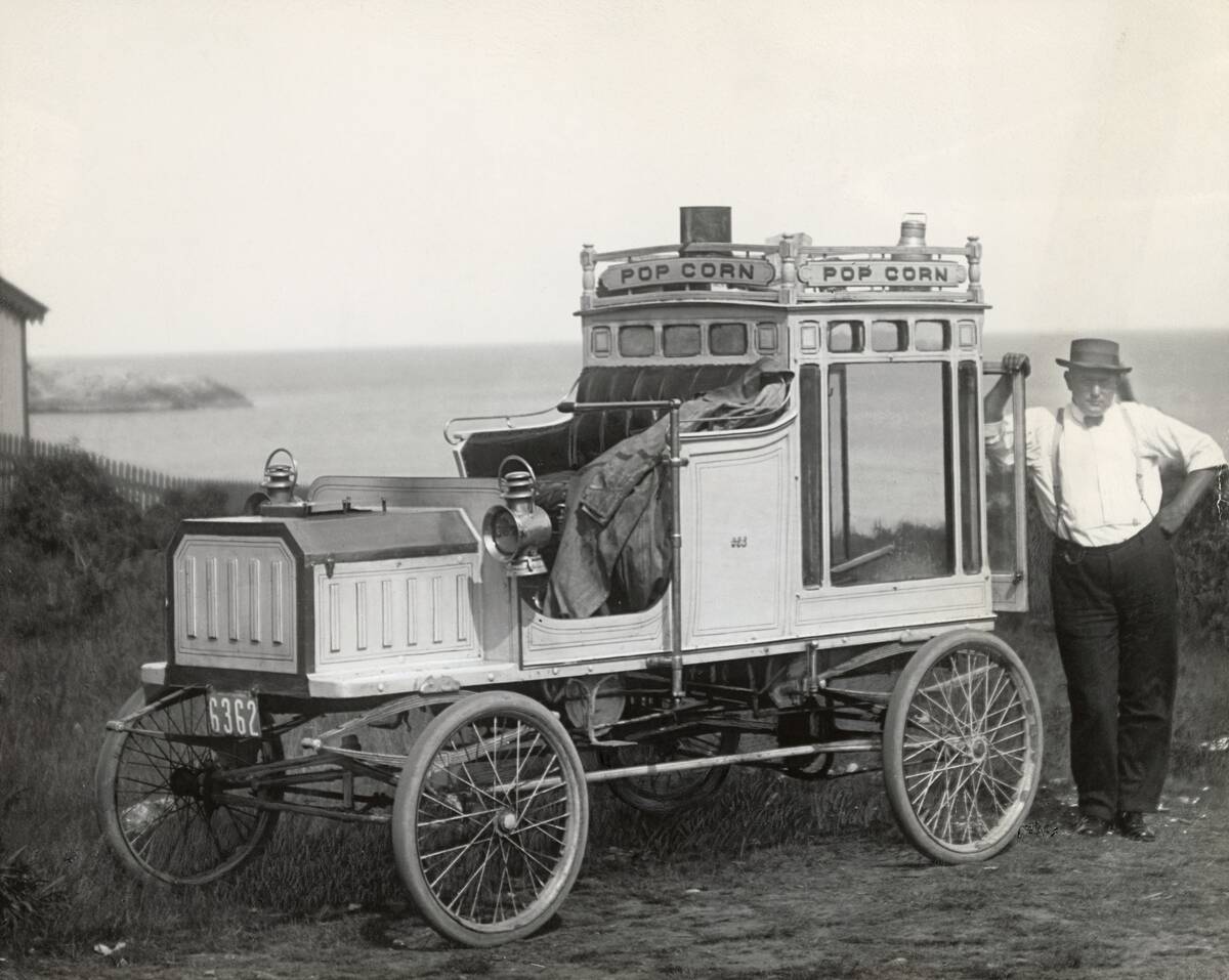 Portrait of Early Popcorn Vendor Next to His Automobile