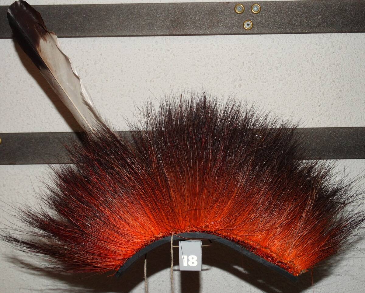 Traditional hairpiece made from dyed porcupine hair and e