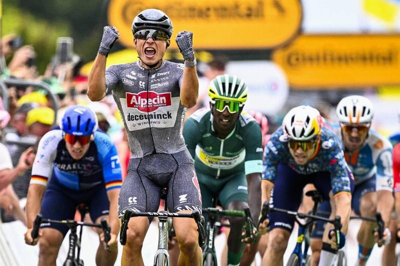 Belgian Jasper Philipsen of Alpecin-Deceuninck celebrates as he crosses the finish line to win stage 10 of the 2024 Tour de France cycling race, from Orleans to Saint-Amand-Montrond, France (187,3 km) on Tuesday 09 July 2024