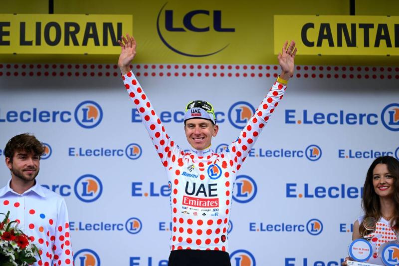 Tadej Pogacar of Slovenia and UAE Team Emirates celebrates at podium as Polka dot Mountain Jersey winner during the 111th Tour de France 2024, Stage 11. 