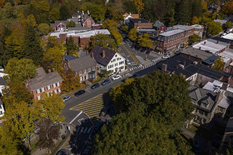Aerial view of homes of scenic Woodstock Vermont, New England in autumn color