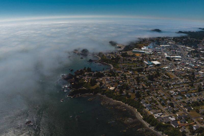 Aerial view on Pacific Ocean of smalltown of Brookings, Oregon