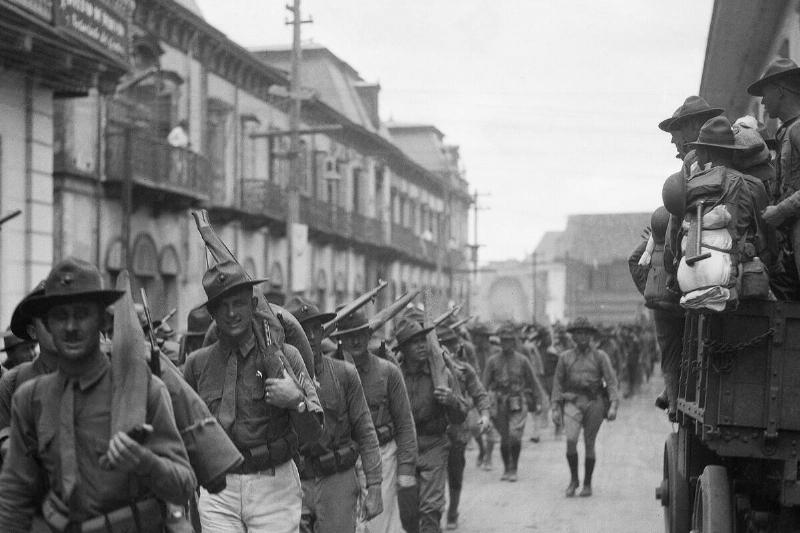 American Soldiers March Through Street