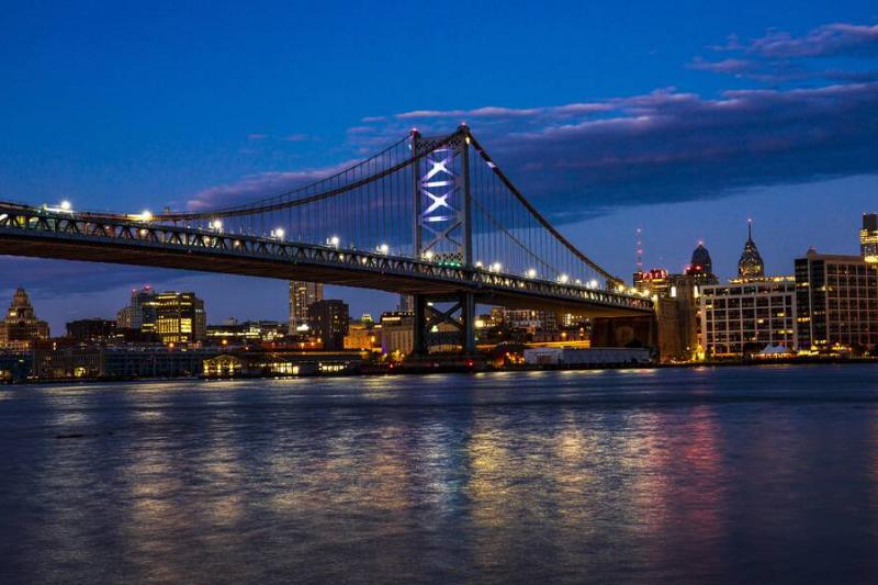 City lights on Ben Franklin Bridge and Philadelphia from Cooper Point, Camden New Jersey