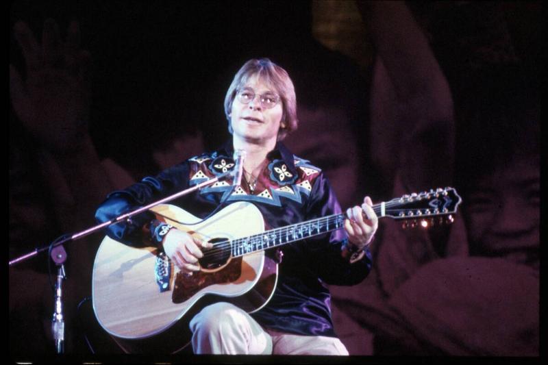 John Denver Performing