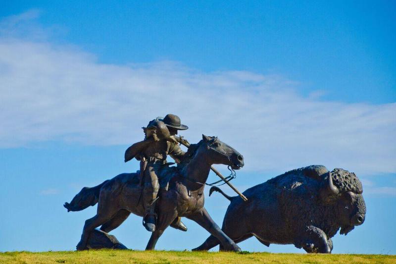 Kansas, Oakley, Buffalo Bill Cultural Center, Sculpture of Cowboy Shooting Buffalo