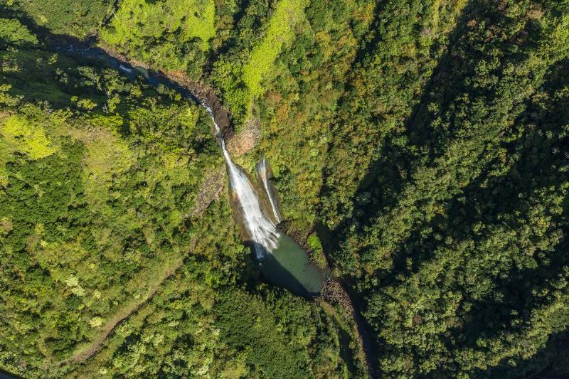 Manawaiopuna Falls, also known as Jurassic Falls, as viewed from a helicopter