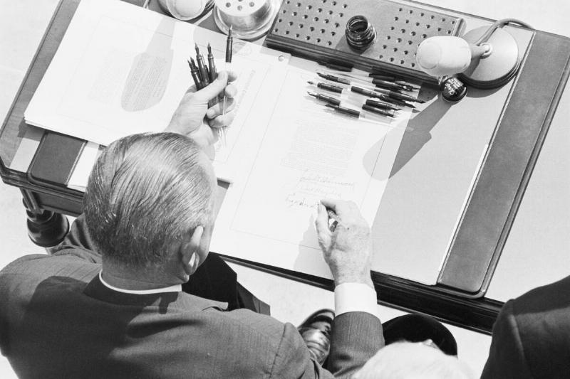 President Johnson Signing Poverty Bill