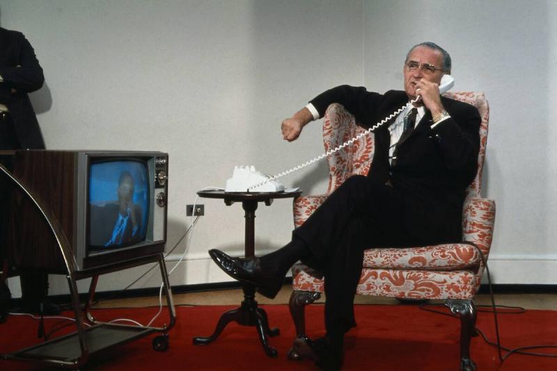 President Lyndon Johnson Sitting in Chair and on Phone