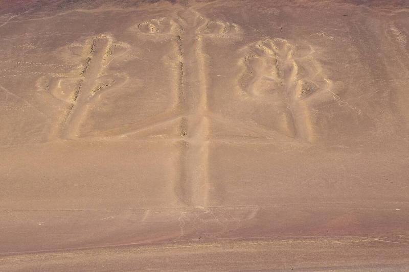 The famous Candelabra lines carved into a hillside facing the sea in Paracas