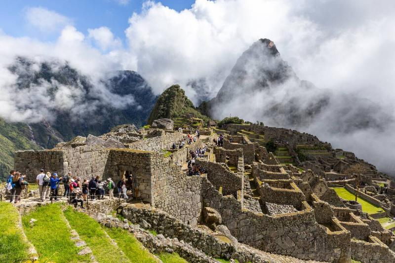 View of tourists on the Machu Picchu archaeological site...
