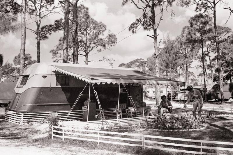 1950s Rv Camper With People...