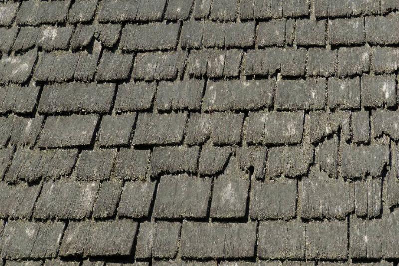 Cracked roof shingles.