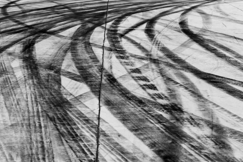 Tire mark on driveway.