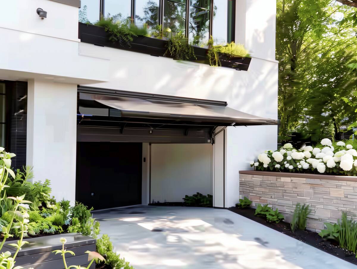 Tilt-up canopy garage door. 